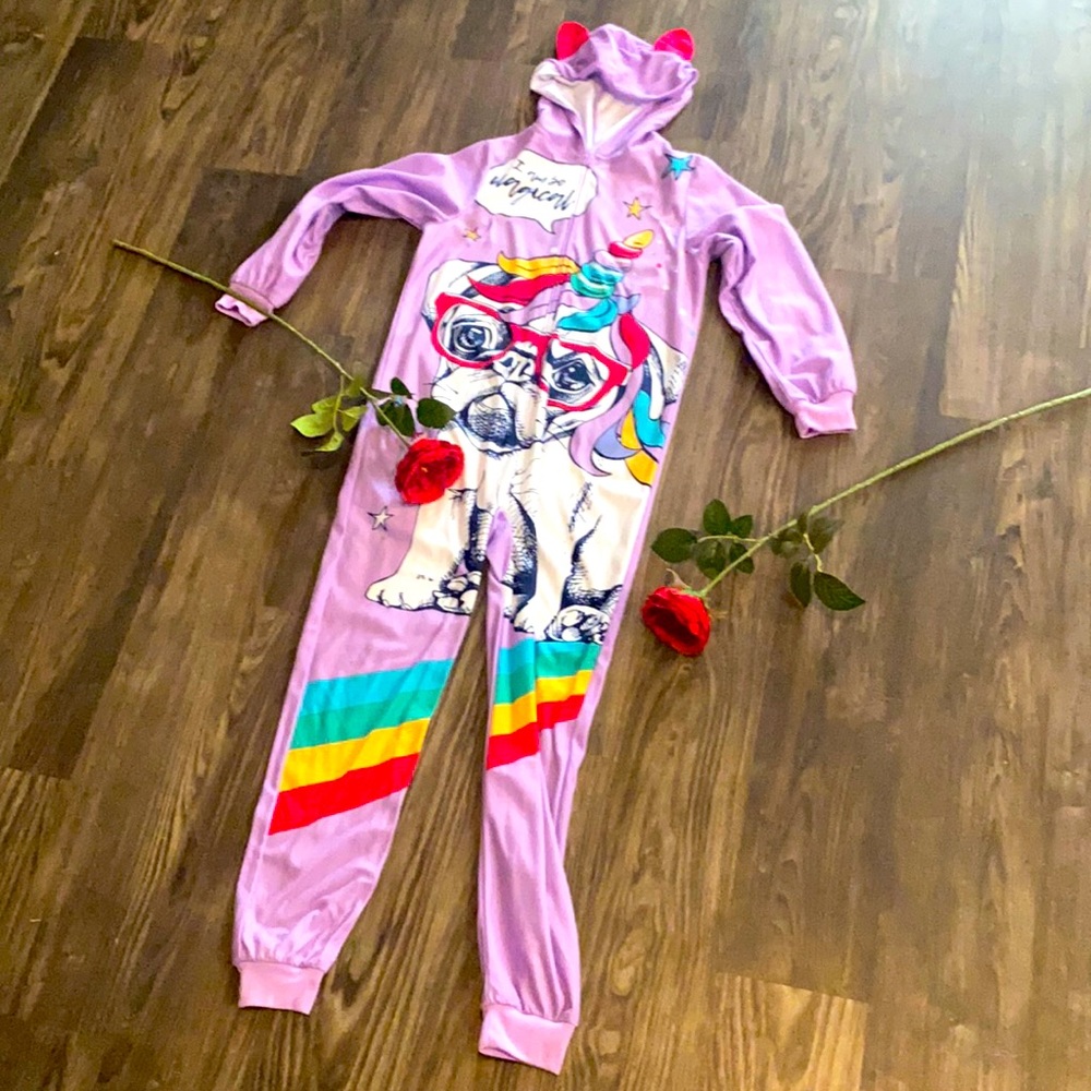 The color is a light purple with a unicorn design